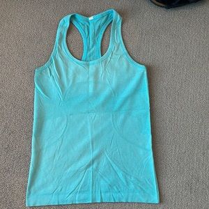 Women’s Lulu Lemon Swiftly Tech tank top. Color turquoise.